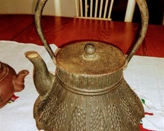 Antique cast iron teapot