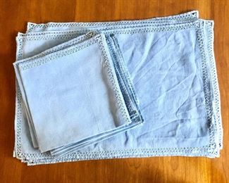 $40 - Set of blue linen placemats, napkins, and runners.  Placemats (9) 16" x 12".  Napkins (8) 17" x 16.5".  Short runner 22" x 9.5".  Long runner 43.5" x 15.5".   