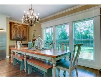 Table is 9 foot cherry wood - 6 chairs- 2 benches. Seats 10-12 comfortably. 