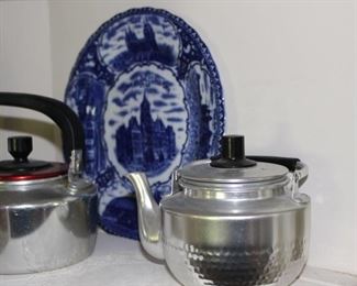 Flow blue and chrome teapots