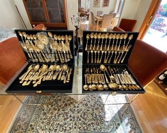 2 full sets of goldtone flatware.