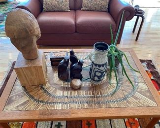 1 of 2 large carved wood head sculptures, and unique accessories.