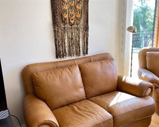 High quality Italian leather loveseat. Also has a matching chair and ottoman.