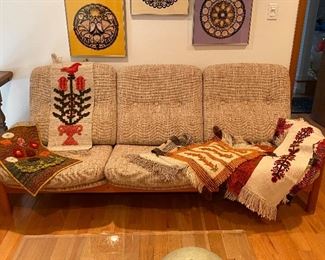 Mid century sofa, as well as several hand woven tapestries.