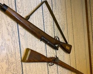 Toy wood rifles.