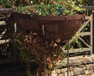 Overlooking the Tennessee River this Copper Base Tub sits on a 4' wrought iron stand.  We have two matching sets or can purchase one. 