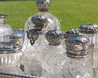 Lifelong collection of antique English hall marked, sterling silver topped, cut glass scent bottles.  All in pristine condition. 