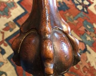 Hand carved “ball and claw” detail on the games table 