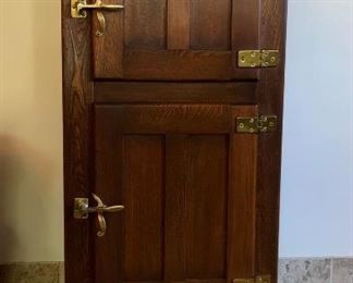 Antique two door ice box, fully restored to hold wine; oak, original hardware