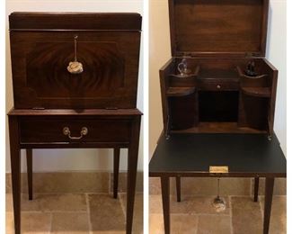 Regency style Henkel Harris mahogany cellerette on stand with fitted interior and decanters 