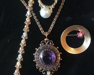 Cartier diamond and ruby pin, Estruscan amethyst tassel pendant, diamond and tri gold bracelet, pearl twisted rope ring 