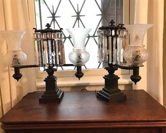 Patinated bronze electrified J &I Cox, NY, Argand lamps with original cut prisms and etched shades, 19th century