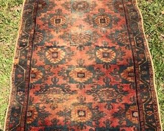 3’6” by 5’8” vintage hand knotted wool Persian rug