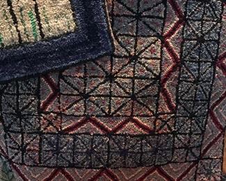 Collection of hand hooked rugs