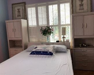 Queen bed - shown with Queen mattress and box spring.  There is also a queen memory foam topper.
