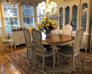 Dining table with 3 - yes, 3 leaves and 10 Chairs!!  Just in time for the holidays!!  Matching buffet and China Hutch