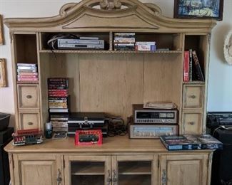 Rooms to Go entertainment center that will fit a flat screen tv