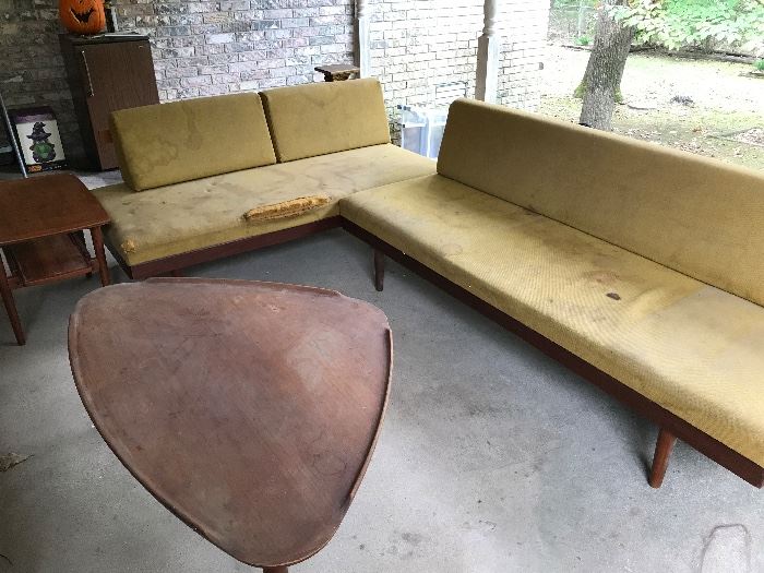 1950's teak wood sectional with triangle coffee table and matching side tables.
Restoration project. 