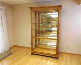 Large Oak Sliding Door Lighted and Mirrored Curio Cabinet with Keys
