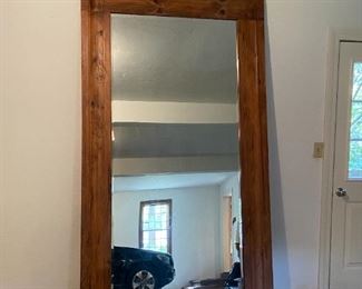 Measuring 8 feet high X 51 inches wide, this solidly constructed wood framed mirror is a jaw dropper!