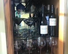 Wine cabinet with refrigerator.  Lights up inside