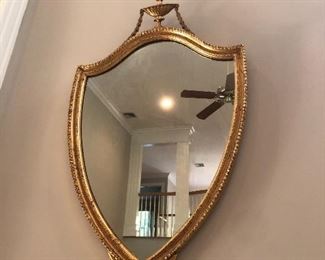 Gold gilt shield mirror