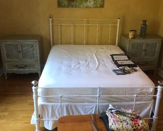 Glass top posts on antique style iron bed