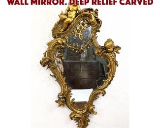 Lot 50 Large French Style Gilt Wall Mirror. Deep relief carved