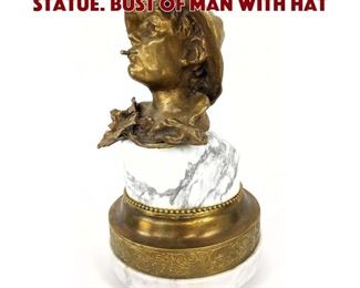 Lot 54 Gilt Metal Marble Figural Statue. Bust of man with hat
