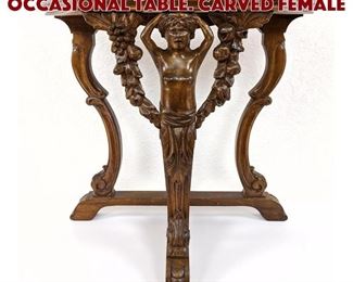 Lot 75 Vintage Angled Mahogany Occasional Table. Carved female