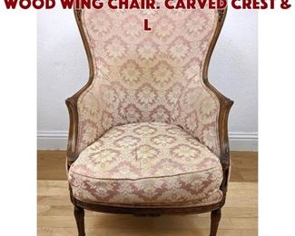 Lot 112 Vintage French Carved Wood Wing Chair. Carved crest l