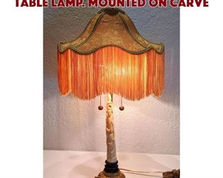 Lot 142 Carved Asian Female Figure Table Lamp. Mounted on carve