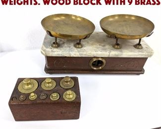 Lot 164 Antique Brass Scale Weights. Wood block with 9 brass