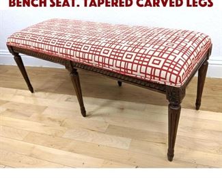 Lot 215 Upholstered Carved Wood Bench Seat. Tapered carved legs