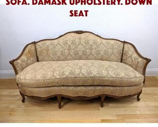 Lot 217 French Floral Carved Sofa. Damask upholstery. Down seat