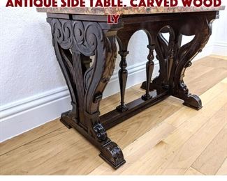 Lot 236 Tennessee Marble Top Antique Side Table. Carved wood ly