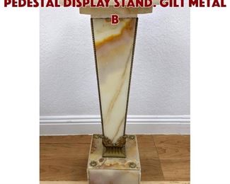 Lot 287 Cream Onyx Tapered Pedestal Display Stand. Gilt metal b