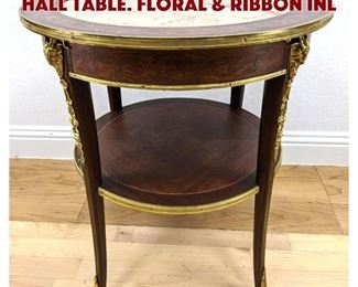 Lot 349 Marble Top Round Center Hall Table. Floral ribbon inl