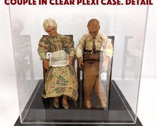 Lot 458 Seated Wax Figure of Couple in Clear Plexi Case. Detail