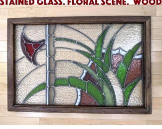 Lot 560 Wood Framed Piece of Stained Glass. Floral scene. Wood