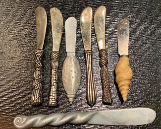 Item 198: Lot of cheese knives: $15