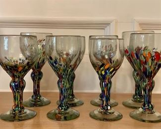 Item 57: (8) Murano style hand blown wine glasses: $125