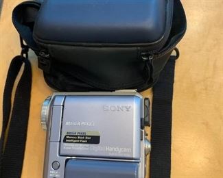 Item 242: Sony HandyCam DCR-PC105 - missing Charging Tray (around $10): $65