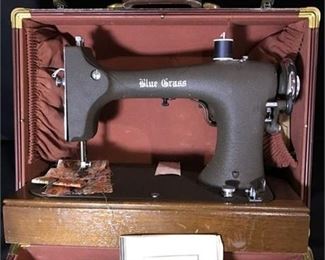 Lot 4
antique Blue Grass sewing machine with Samsonite carrying case