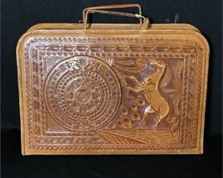 Lot 9
embossed leather zippered valise