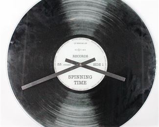 Lot 650
Spinning Time Record Wall Clock