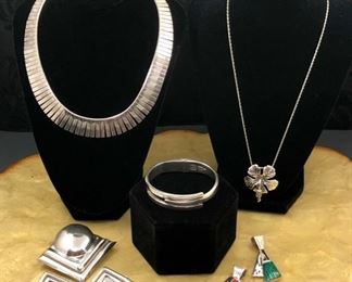 Sterling silver jewelry including sterling and 14KT BGM Modernist pendants. 
