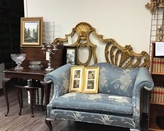 Hollywood Regency king sized gilt headboard. Vintage loveseat. Mahogany game table.