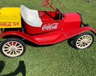 Model T Shiners style car with tilt wood bed over top of motor. In original condition but motor has been gone through and runs great and the tire tubes have been replaced. Originally owned by the Greenville, NC Coke plant in the 80s and was used in parades and our collector obtained it when they stopped using it sometime later. Awesome piece to add to or start a collection.