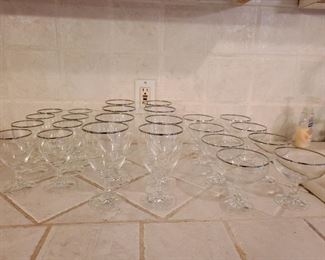 Crystal w/silver rim
8 - wine glasses
8 - goblets
8  champagne glasses